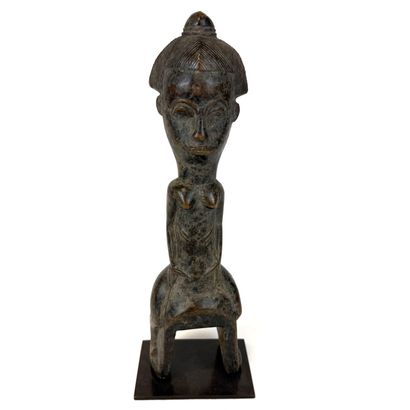 BAOULÉ, Ivory Coast
Large loom pulley. Female...