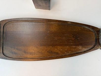 Fish-shaped cutting board made of wood and...