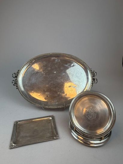 Four 925°/°° silver bottle coasters, with...