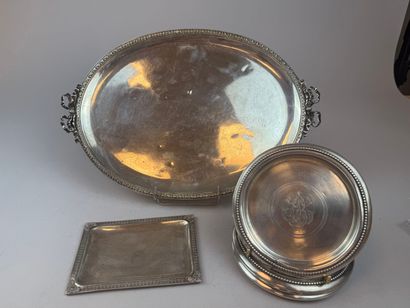Four 925°/°° silver bottle coasters, with...