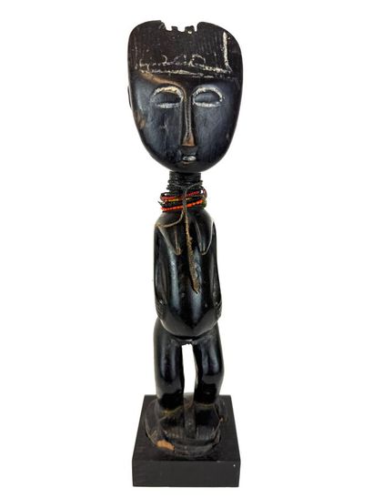 ATTIÉ, Ivory Coast
Female statuette in blackened...