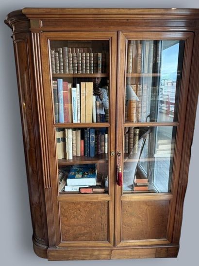 Pair of flamed mahogany bookcases with two...