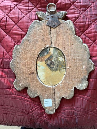 Small gilded and carved wooden mirror decorated...