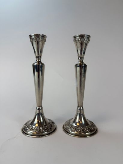 Pair of 950°/°° silver candlesticks, with...