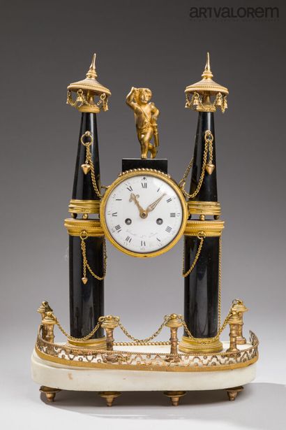 Portico clock in white marble with two columns...