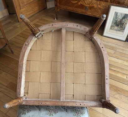 Armchair with a gondola-style backrest made...