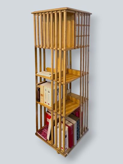 Rotating bookshelf made of cream-lacquered...