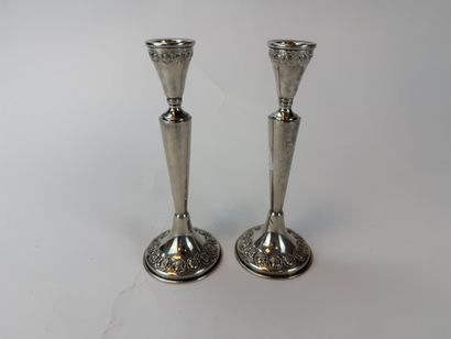 Pair of 950°/°° silver candlesticks, with...