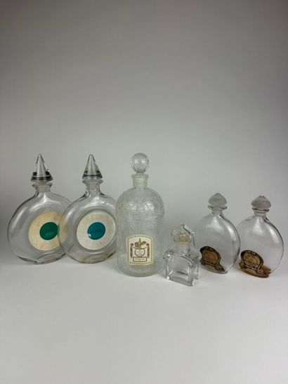 GUERLAIN
- Deux flacons modèle disque, Eau...