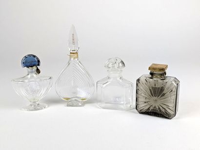 GUERLAIN 
Ensemble de flacons vides et un...
