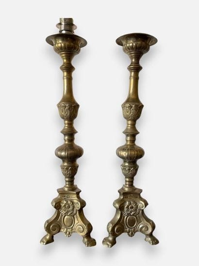 Pair of embossed brass candlesticks with...