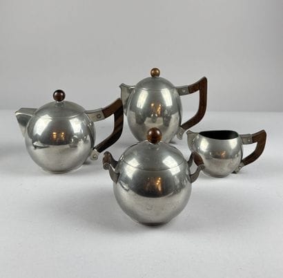 Spherical pewter tea set with rosewood handles...