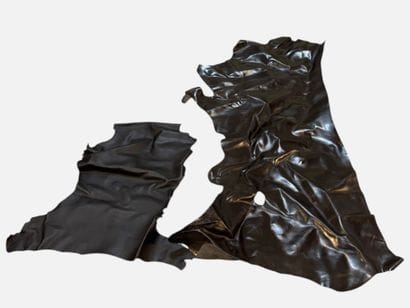 [LEATHER HANDLE]
Box containing goatskins...