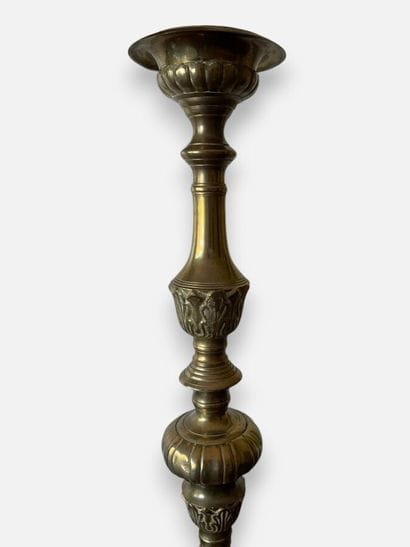 Pair of embossed brass candlesticks with...