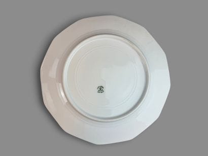 LIMOGES
Porcelain dinner service with a gold...