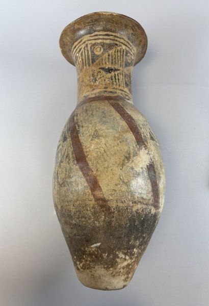 Two terracotta urns with geometric decoration,...