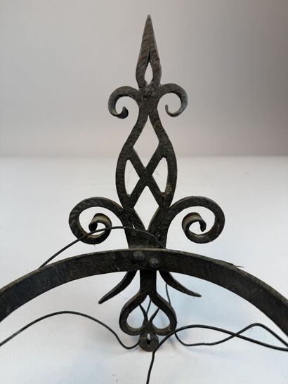 Set of six black-patinated wrought-iron wall...