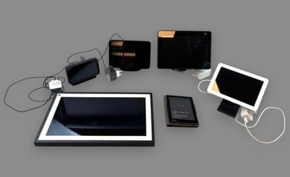 Set of 5 Amazon-connected e-readers.
Some...