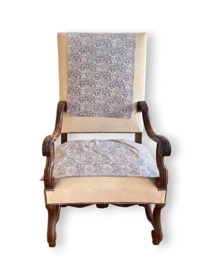 Molded and carved wooden armchair, straight...
