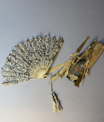 [FANS]
Set of eight fans made of lace and...