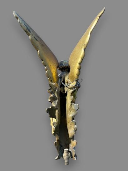 Small bronze angel with a speech bubble....