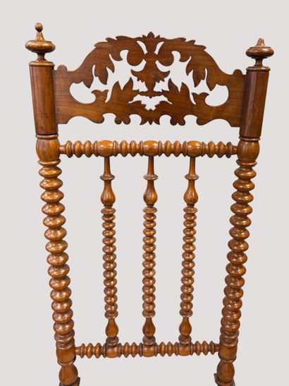 Turned wooden chair with a high backrest...
