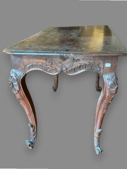 Carved oak table with a drawer that opens...