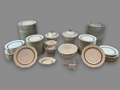 LIMOGES
Porcelain dinner service with a gold...