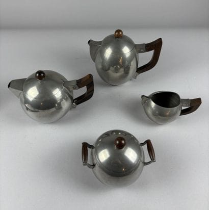 Spherical pewter tea set with rosewood handles...