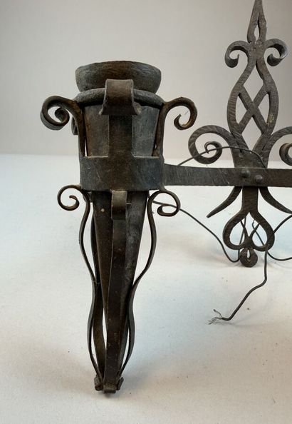 Set of six black-patinated wrought-iron wall...