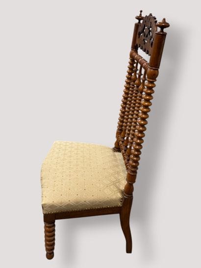 Turned wooden chair with a high backrest...