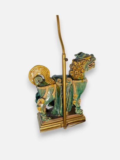 ASIA
Fô dog made of green and ochre glazed...