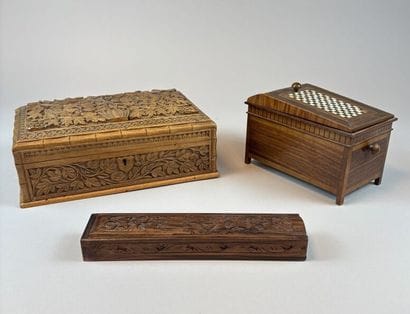 Set of three natural and carved wooden boxes,...
