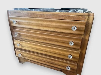 Light oak chest of drawers with fluted decoration,...