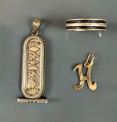 800°/°° silver set consisting of: 
- A double-spiral...