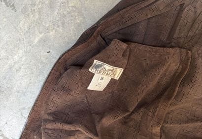 TO BE PACKED TOGETHER
HERMES
Brown leather...