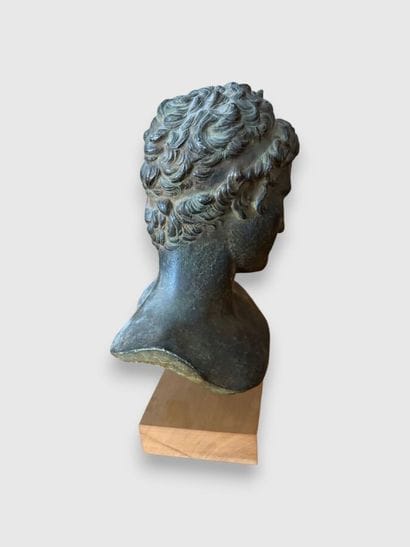Faience bust of a man with a green patina...