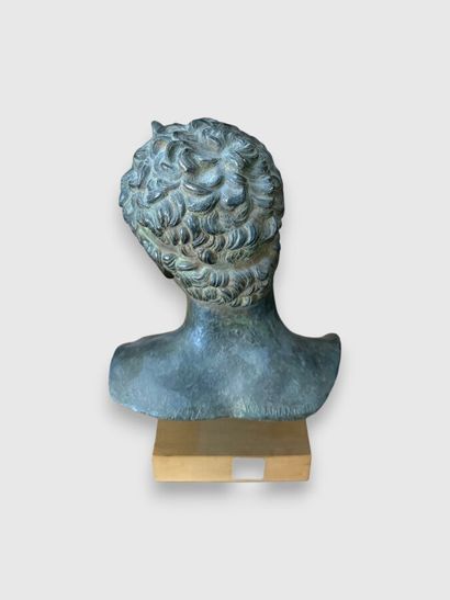 Faience bust of a man with a green patina...
