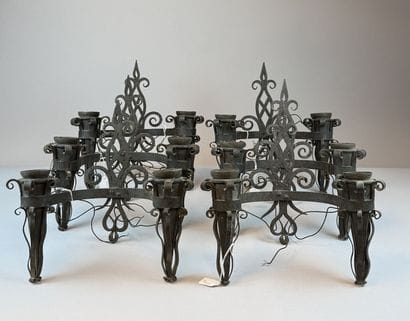 Set of six black-patinated wrought-iron wall...