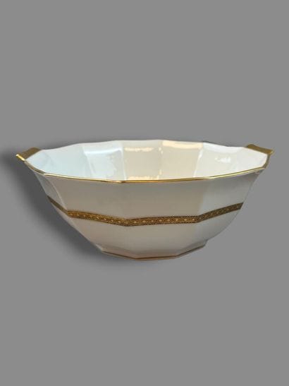 LIMOGES
Porcelain dinner service with a gold...