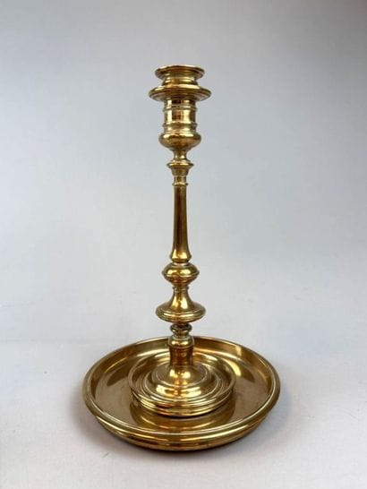 Pair of red brass candlesticks with fluted...