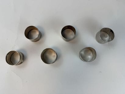 Set of 5 925°/°° silver napkin rings in different...