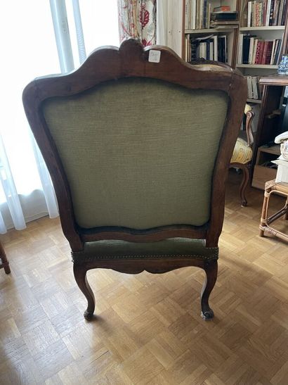 Molded and carved oak armchair with curved...