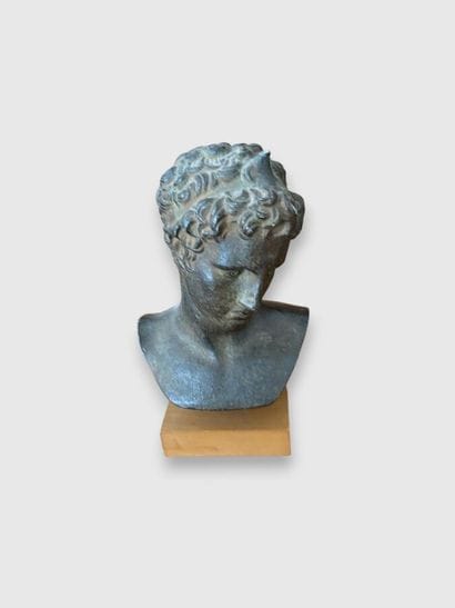 Faience bust of a man with a green patina...