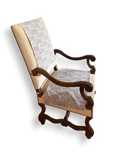 Molded and carved wooden armchair, straight...