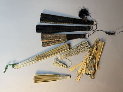 [FANS]
Set of eight fans made of lace and...