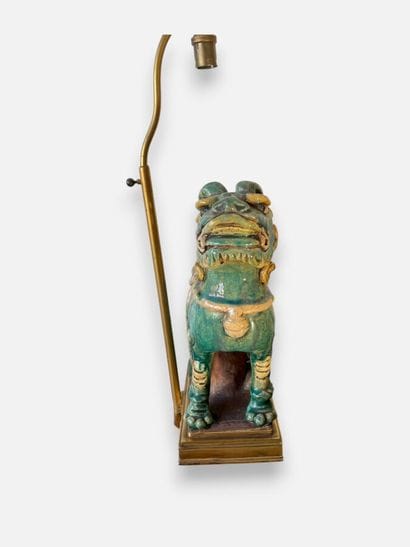 ASIA
Fô dog made of green and ochre glazed...