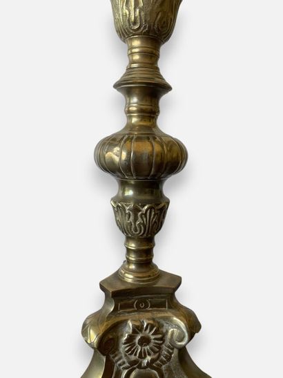 Pair of embossed brass candlesticks with...
