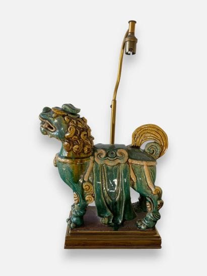 ASIA
Fô dog made of green and ochre glazed...
