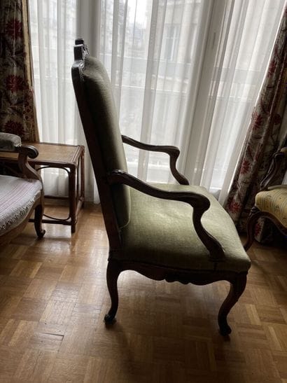 Molded and carved oak armchair with curved...